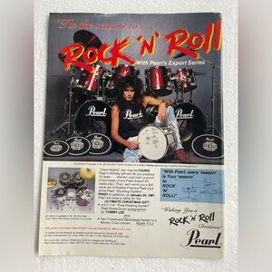 Pearl Red and Black Drum Set pinup of Motley Crue’s Tommy Lee